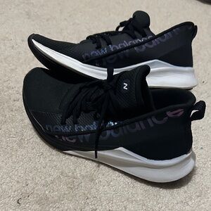 New Balance Women's Black and White Sneakers